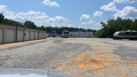 row of self storage units and RV parking at self storage facility