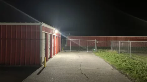 Well lit storage facility at night