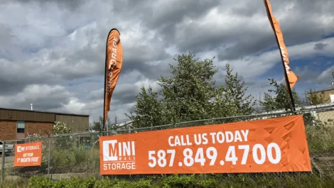 signage and secure gate at self storage facility