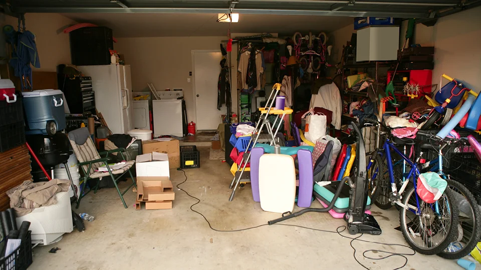 Junk in a garage needs to be moved to a storage unit