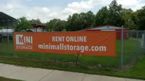 Fence banner at self storage facility