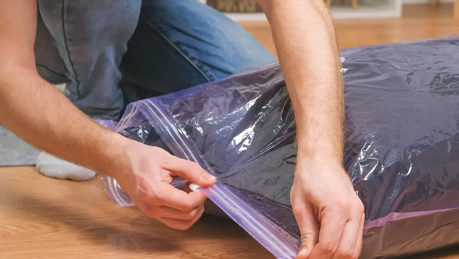 using a vacuum-sealed bag to store blankets
