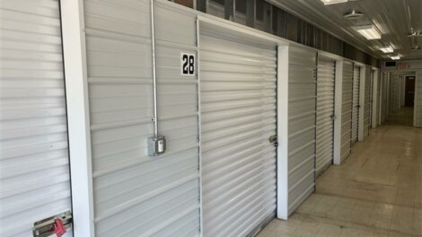 Inside row of self storage units at self storage facility